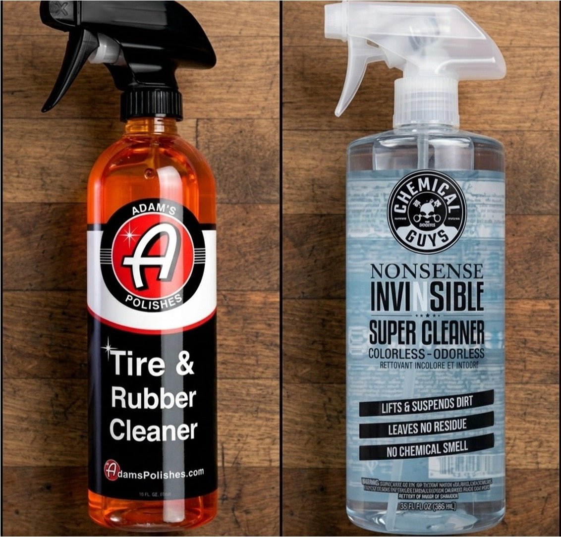 Adam's Tire & Rubber Cleaner beside Chemical Guys Nonsense Invinsible Super Cleaner on a wood surface.