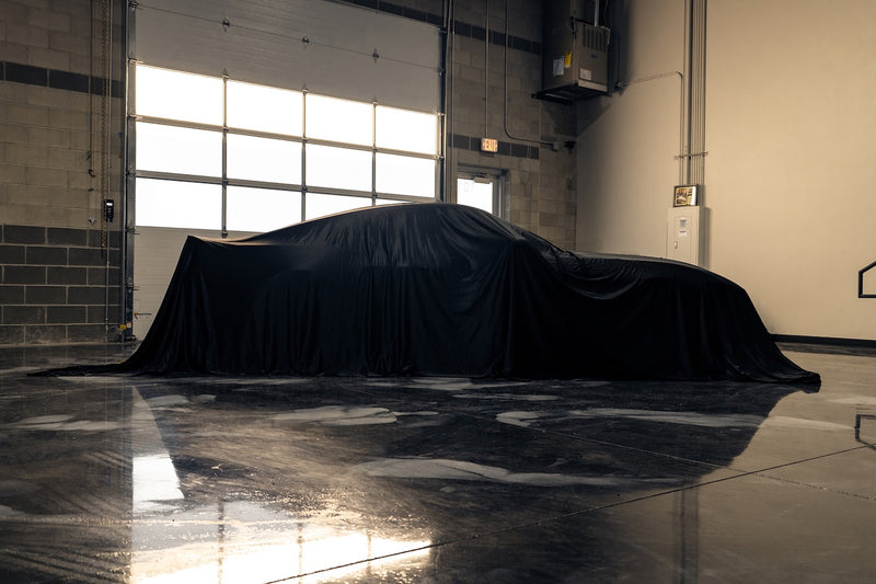 WillerTime Outlaw giveaway car under a drape