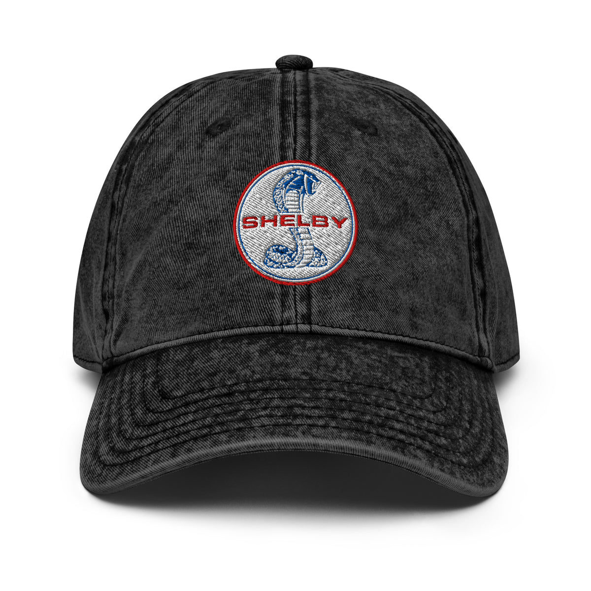 Washed black cotton twill dad cap with embroidered Shelby cobra badge — front view